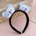 Plush doll headband