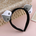 Plush doll headband